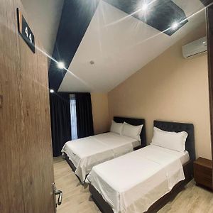 Kamer met een Queen Size Bed